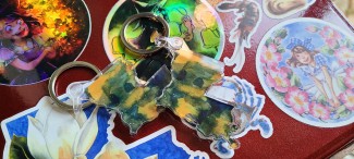 An acrylic keychain of the state of Louisiana in watercolor