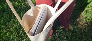 Interior shot of the bag to give you an idea of how much it can hold. Inside is my laptop, a sketchbook, and my purse.